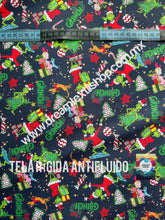 Cargar imagen en el visor de la galería, Microfibra Antifluidos Rígido Grinch Dulce fondo azul
