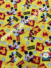 Cargar imagen en el visor de la galería, Microfibra Stretch Antifluidos Mickey Silueta fondo Amarillo
