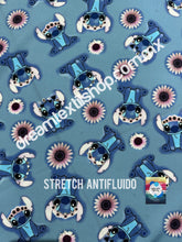 Cargar imagen en el visor de la galería, Microfibra Stretch Antifluidos Stitch fondo azul
