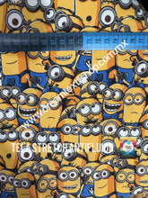 Cargar imagen en el visor de la galería, Microfibra Stretch Antifluidos Minions caritas
