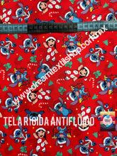 Cargar imagen en el visor de la galería, Microfibra Antifluidos Rígido Stitch fondo rojo navideño
