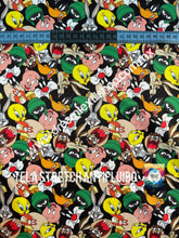 Cargar imagen en el visor de la galería, Microfibra Stretch Antifluidos Looney tunes fondo negro
