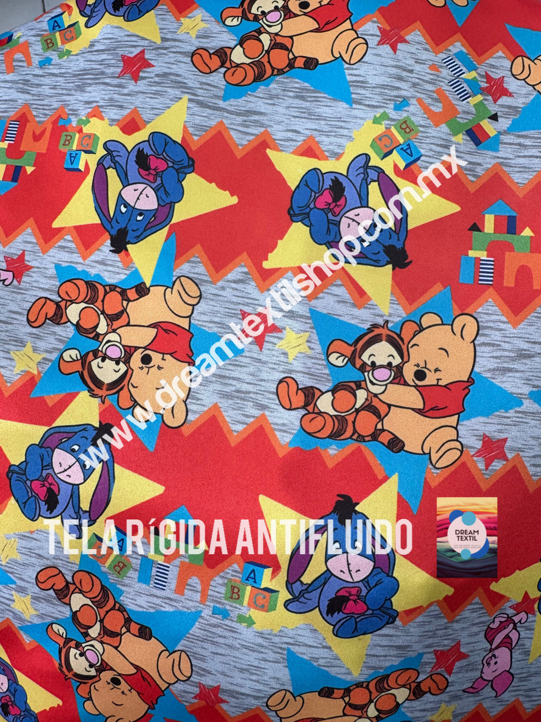 Microfibra Antifluidos Rígido Winnie Pooh triangulos