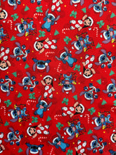 Cargar imagen en el visor de la galería, Microfibra Stretch Antifluidos Stich fondo rojo navideño
